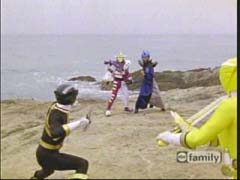 Black and Yellow Rangers take on Jindrax and Toxica who have the crystal