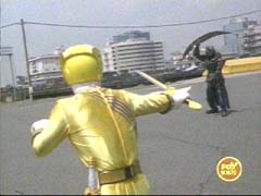 Yellow Ranger and Zenaku face off